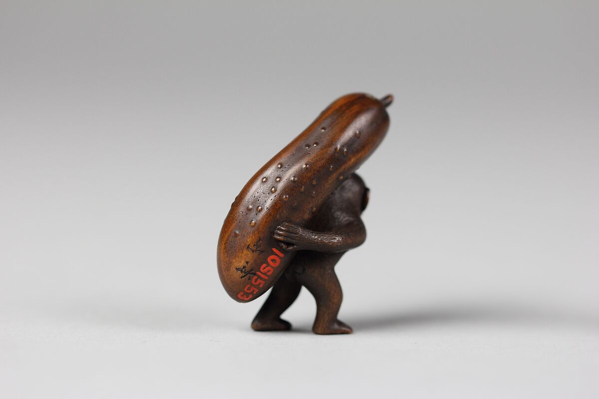 Netsuke of Monkey Carrying a Cucumber on His Back, Wood, Japan