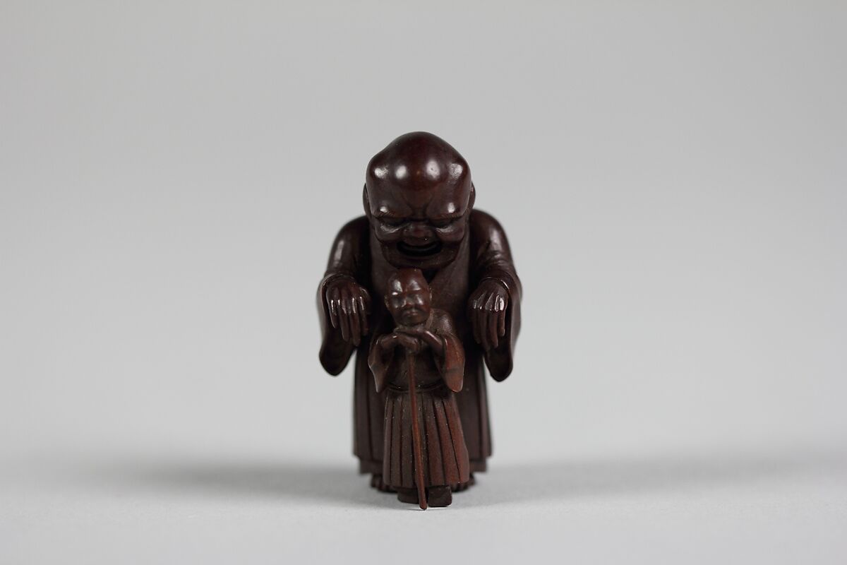 Netsuke of Ghost Trying in Vain to Frighten Blind Man, Wood, Japan 