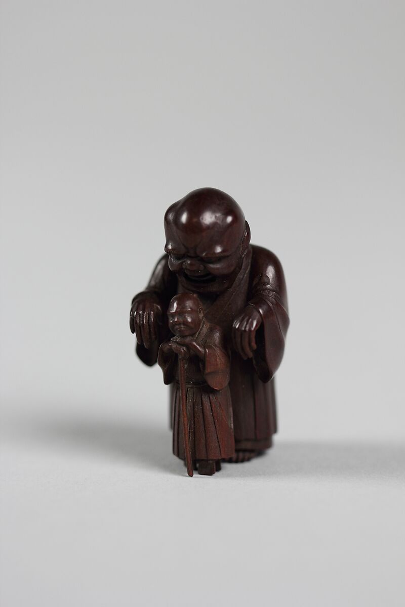 Netsuke of Ghost Trying in Vain to Frighten Blind Man, Wood, Japan