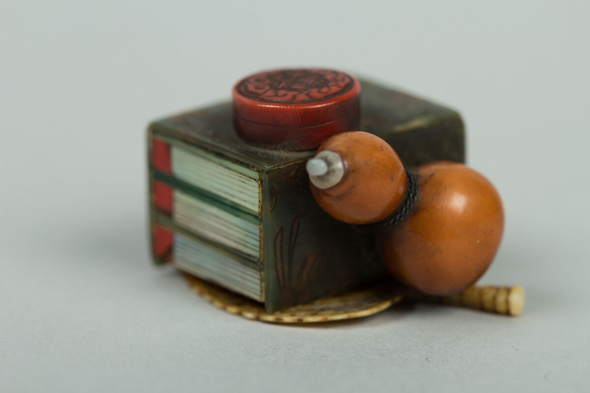 Netsuke of Books, a Gourd, Fan and Box, Ivory and jade, Japan 