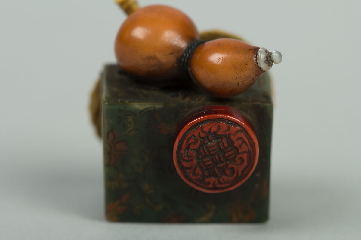 Netsuke of Books, a Gourd, Fan and Box, Ivory and jade, Japan
