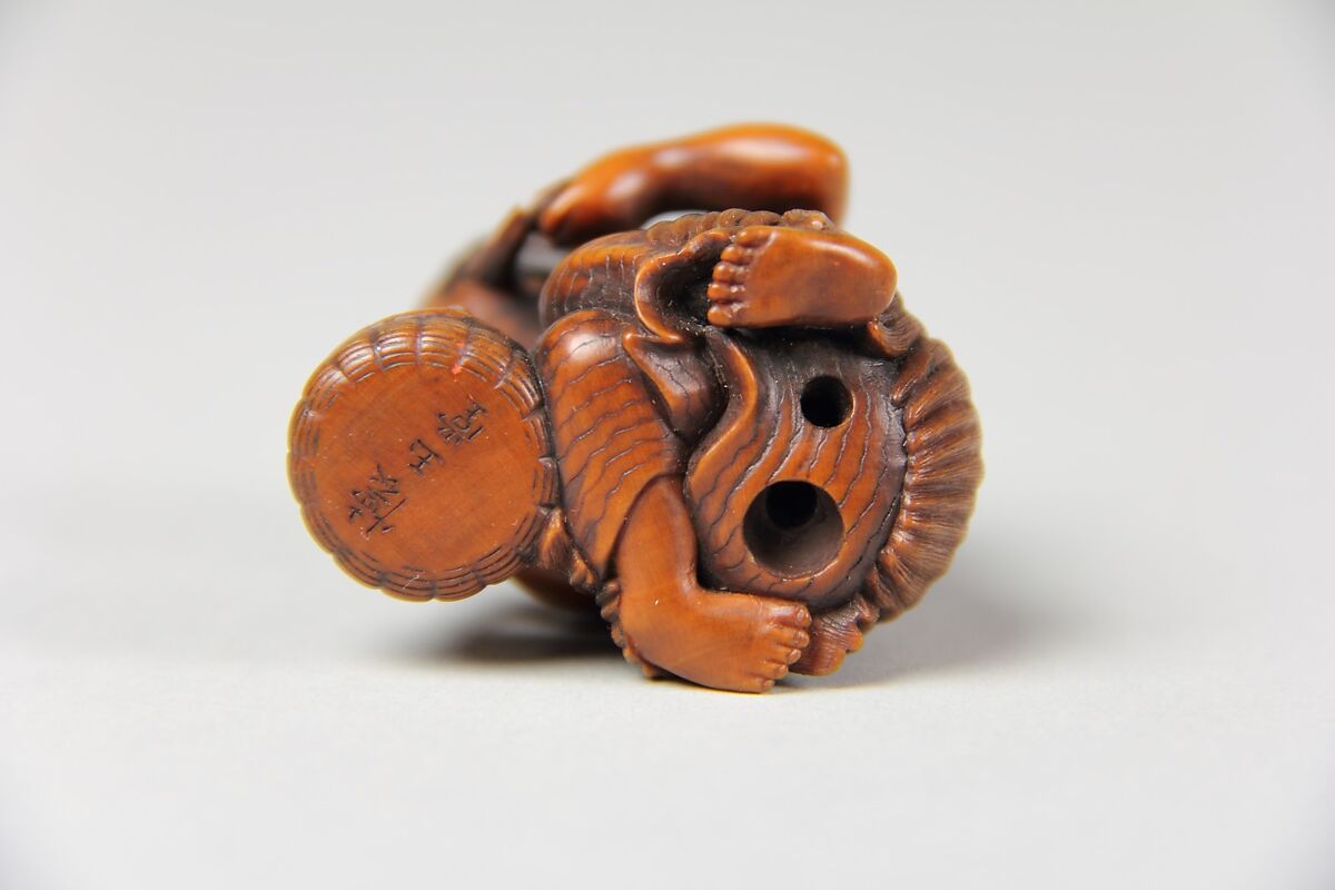 Netsuke of Woman with a Basket of Clams, Wood, Japan