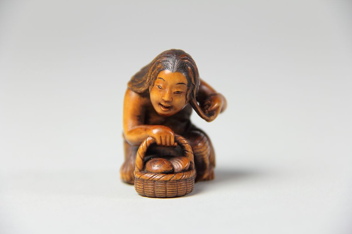 Netsuke of Woman with a Basket of Clams, Wood, Japan 