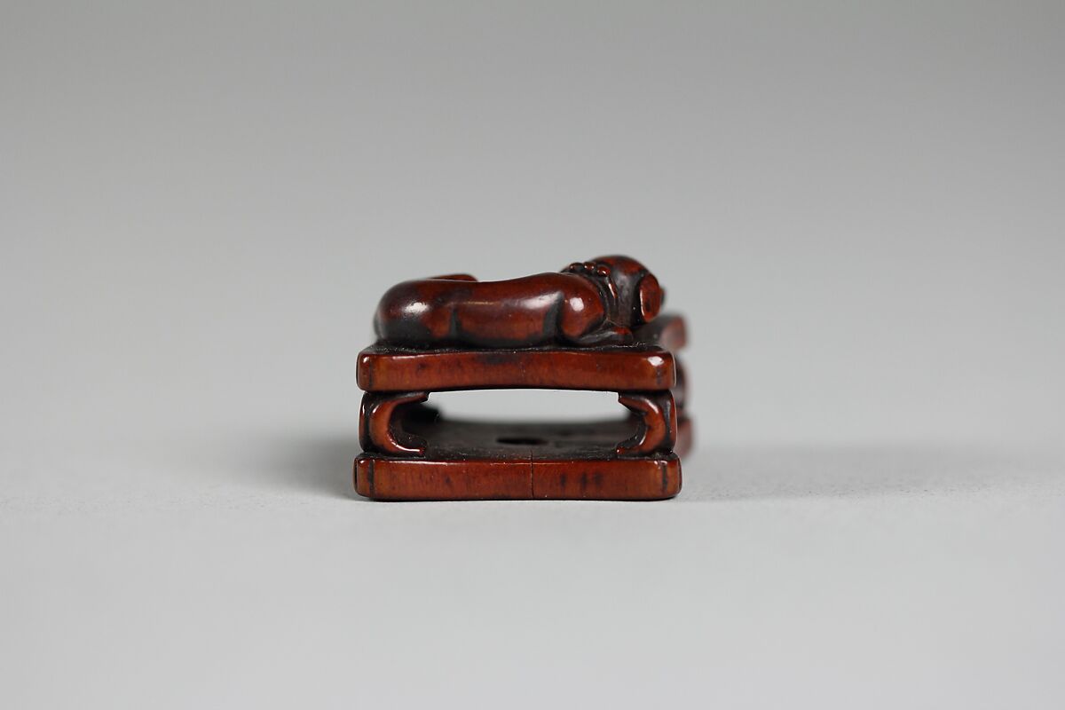 Netsuke of Dog and Fan on a Bench, Wood, Japan