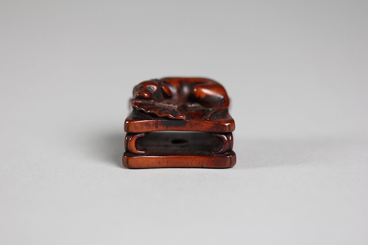 Netsuke of Dog and Fan on a Bench, Wood, Japan 