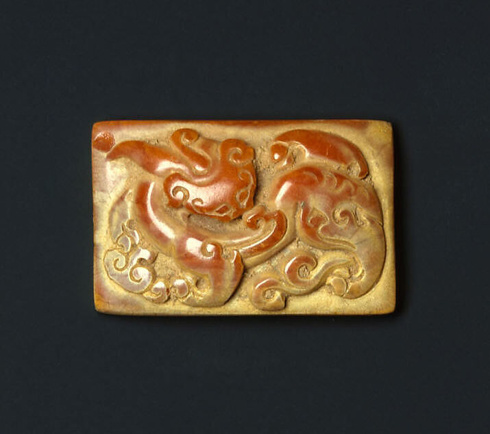 Ornamental plaque, Amber with incised decoration, China 