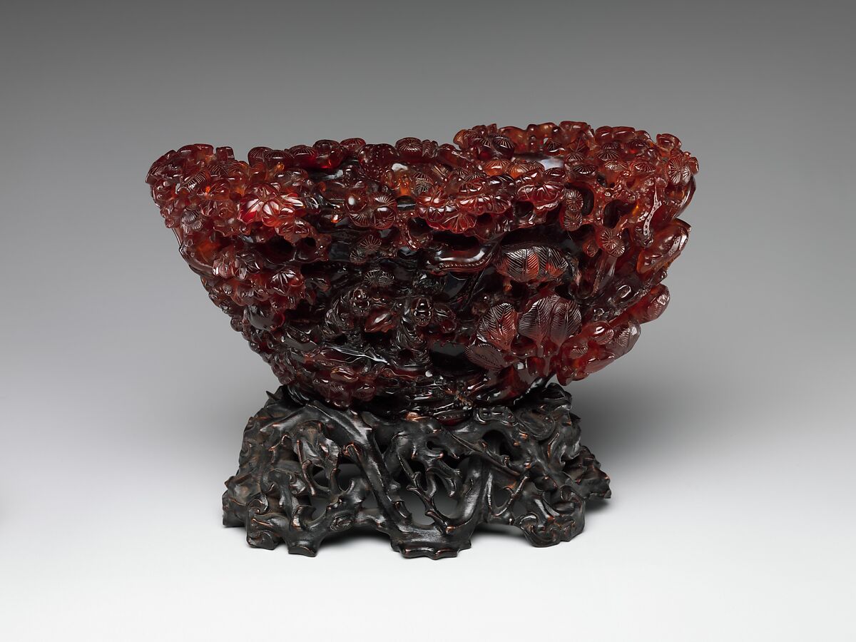 Ornament with landscape and figures, Amber, China