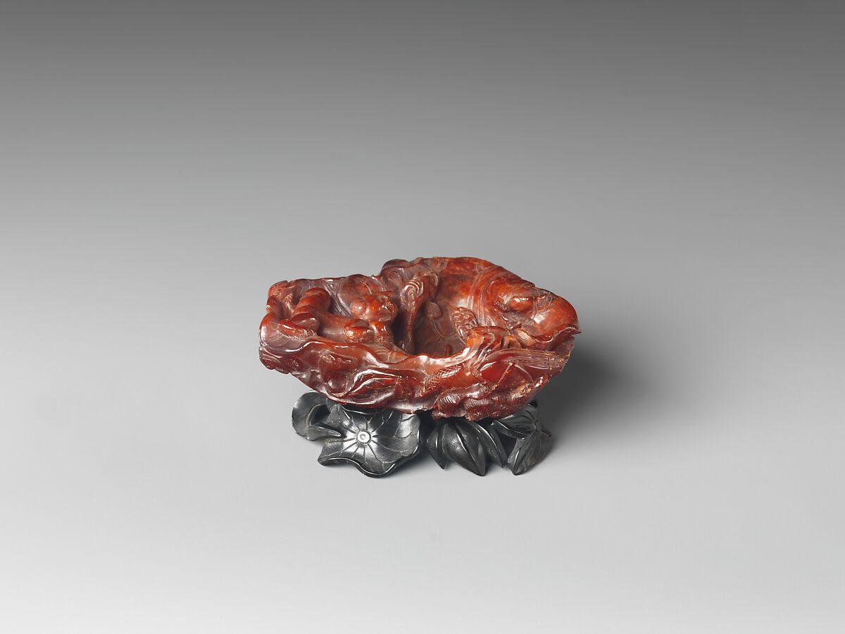 Dish with a Child Chasing a Fish, Amber, China