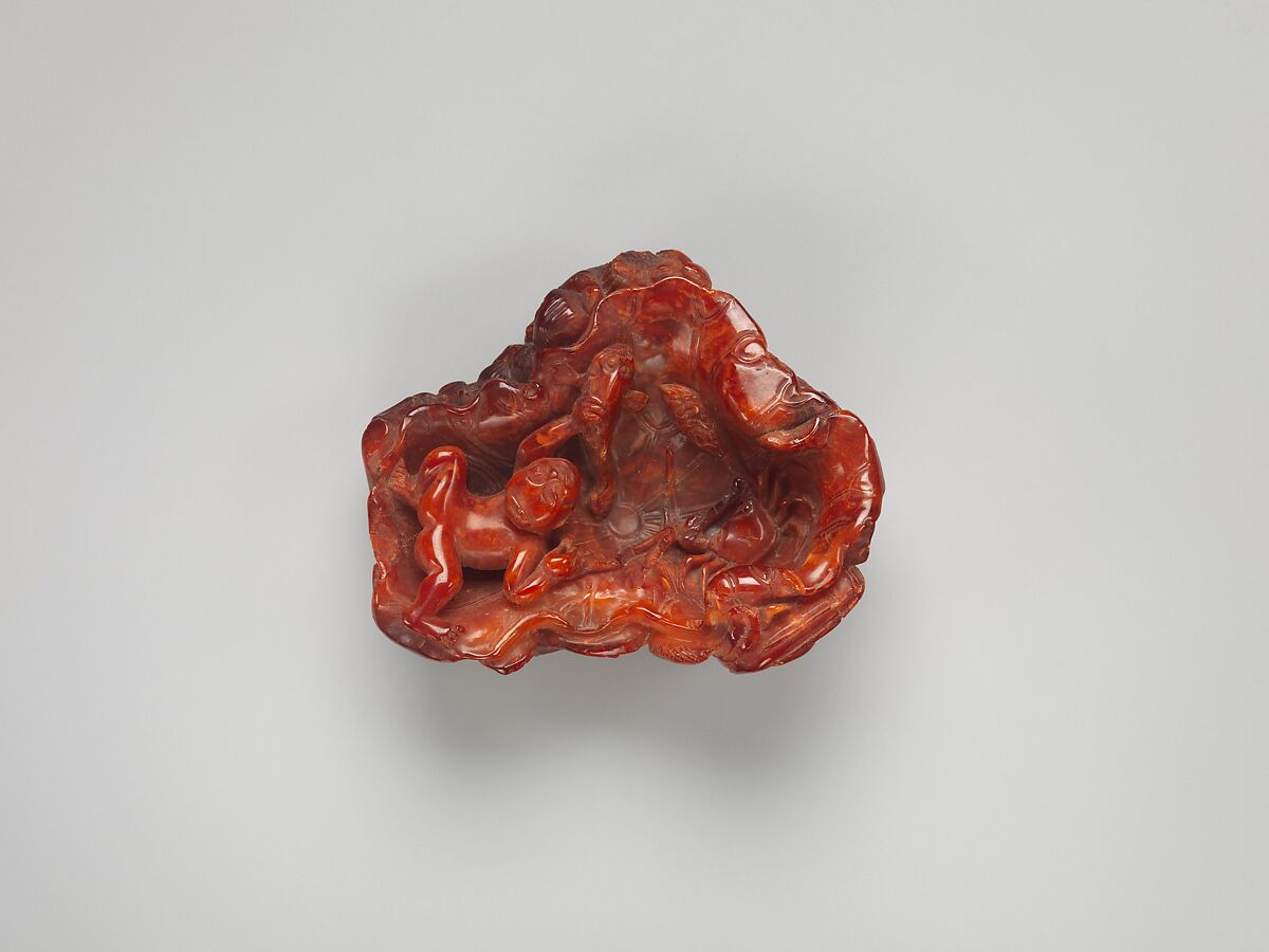 Dish with a Child Chasing a Fish, Amber, China