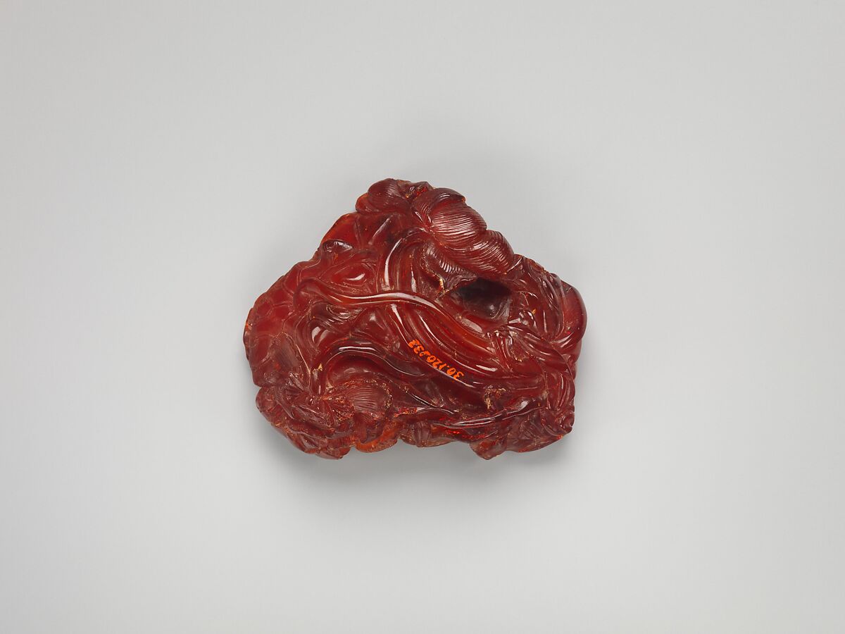 Dish with a Child Chasing a Fish, Amber, China