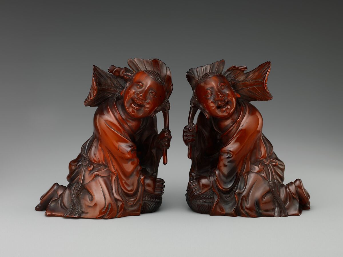 Boy with leaves and box, Horn, China