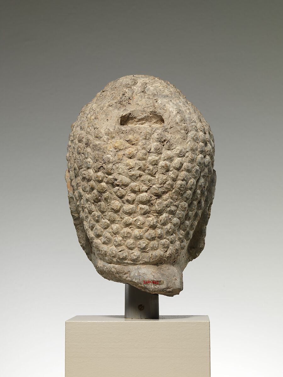 Head of a Buddha, Limestone with traces of pigment and gilding, China