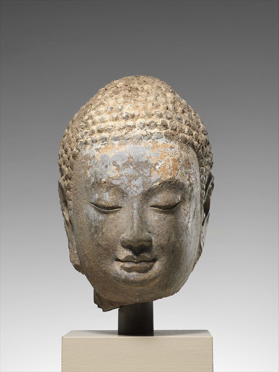 Head of a Buddha, Limestone with traces of pigment and gilding, China 