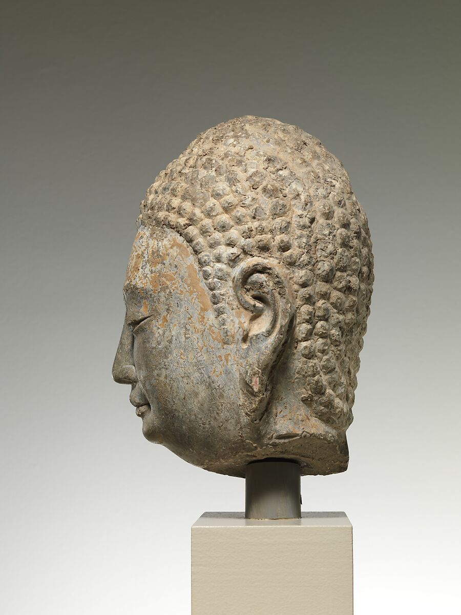 Head of a Buddha, Limestone with traces of pigment and gilding, China