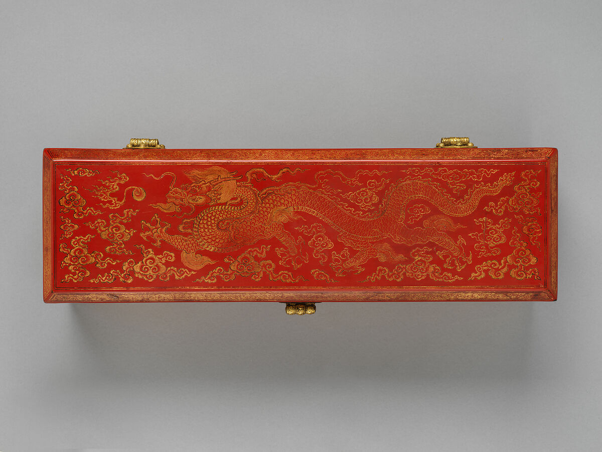 Sutra box with dragons amid clouds, Red lacquer, incised decoration, gold inlay, damascened brass lock and key, China