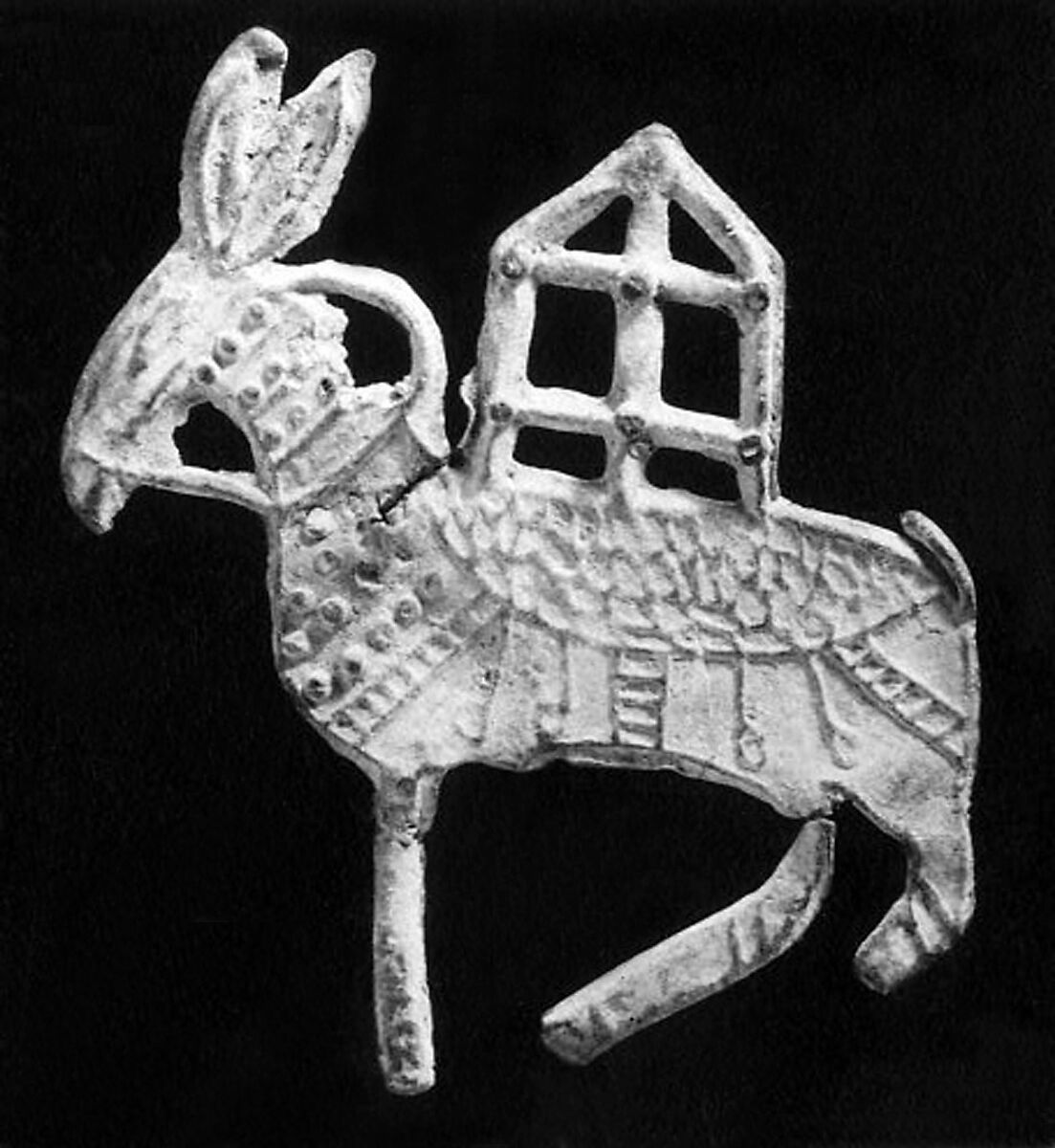 Plaque in the shape of a donkey, Lead, China? 