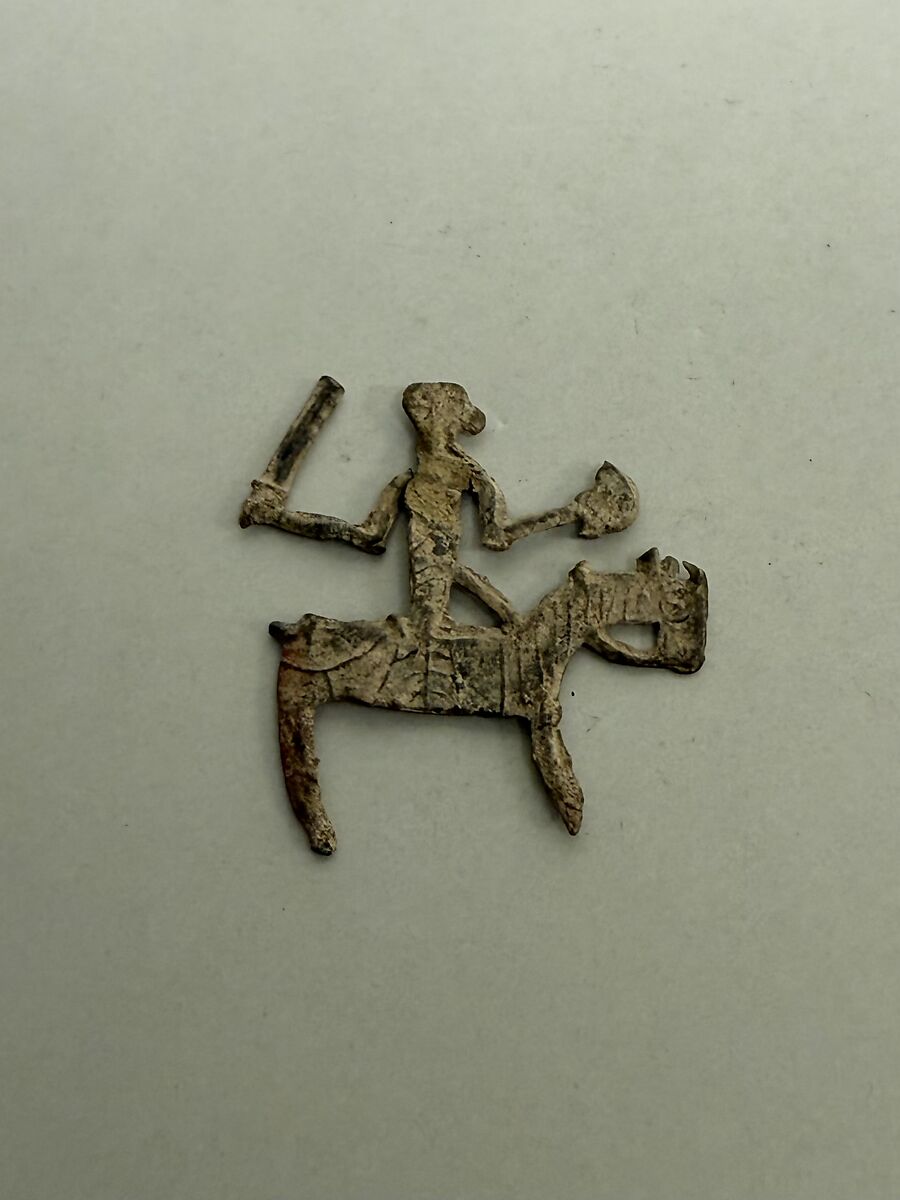 Plaque in the shape of a horse and rider, Lead, China?