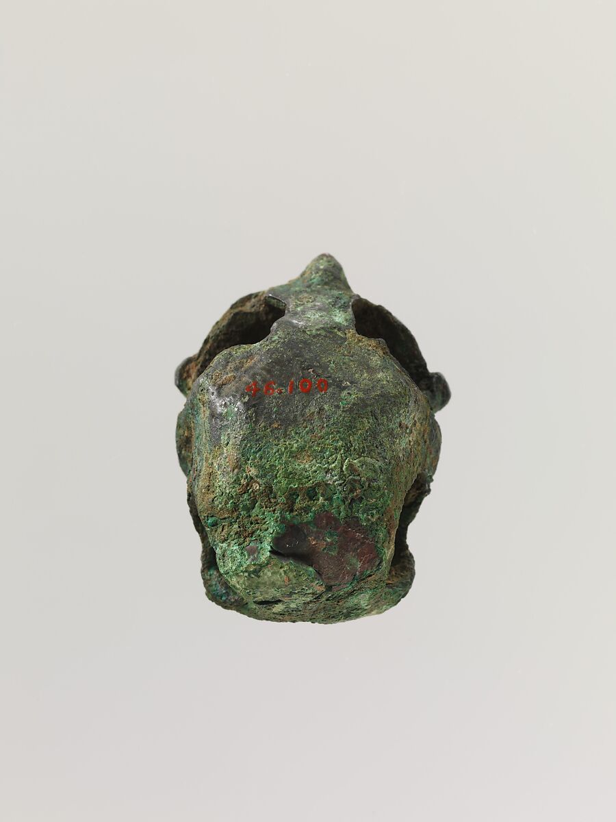 Fitting in the shape of a man grasping a tiger head, Bronze, China