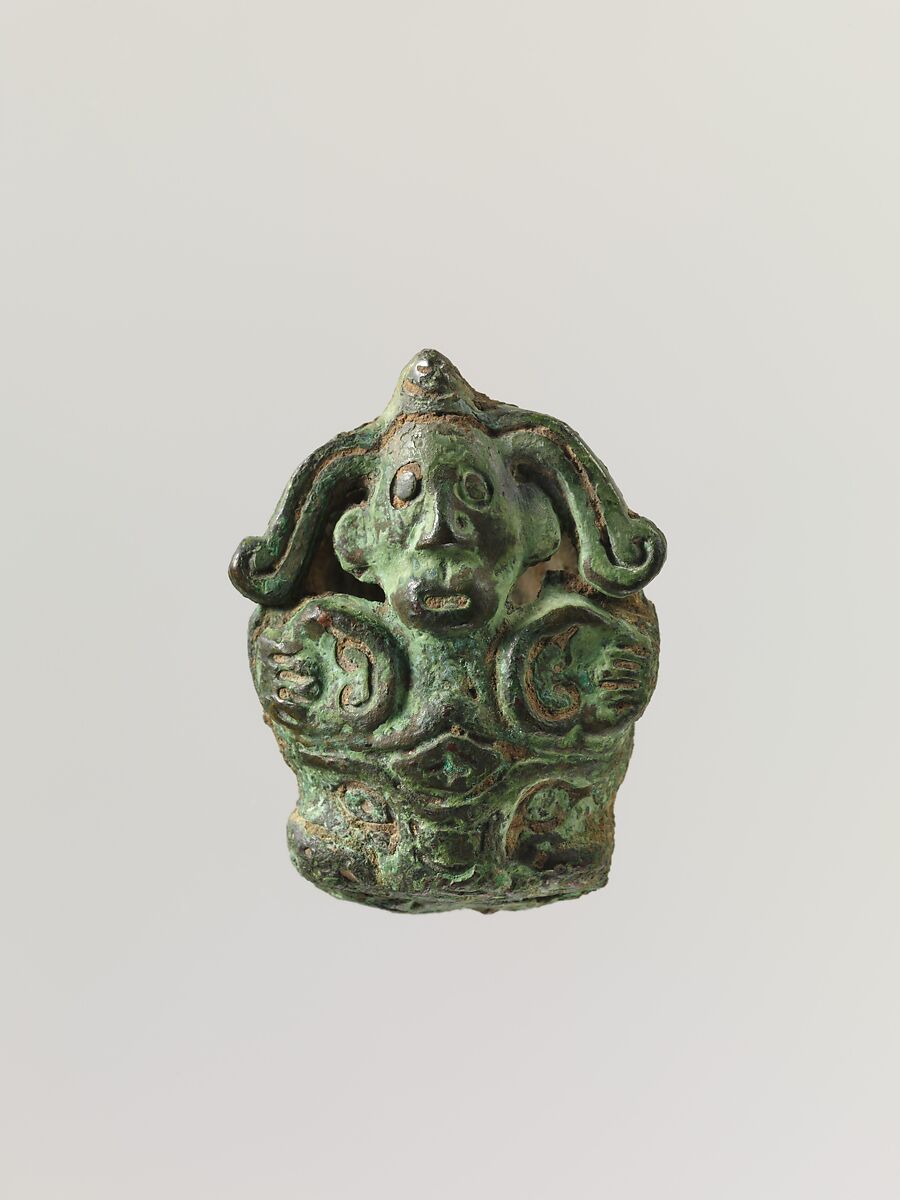 Fitting in the shape of a man grasping a tiger head, Bronze, China