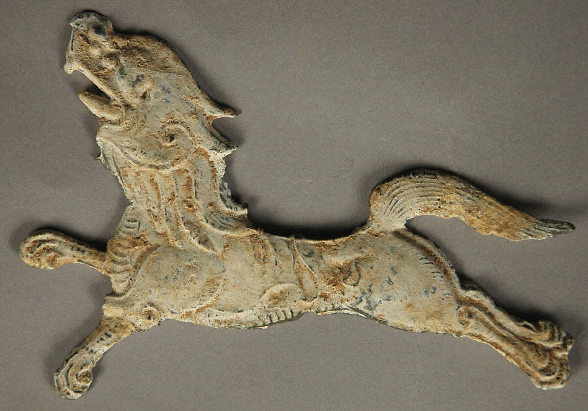 Plaque in the shape of a mythical animal, Lead, pigment, China 