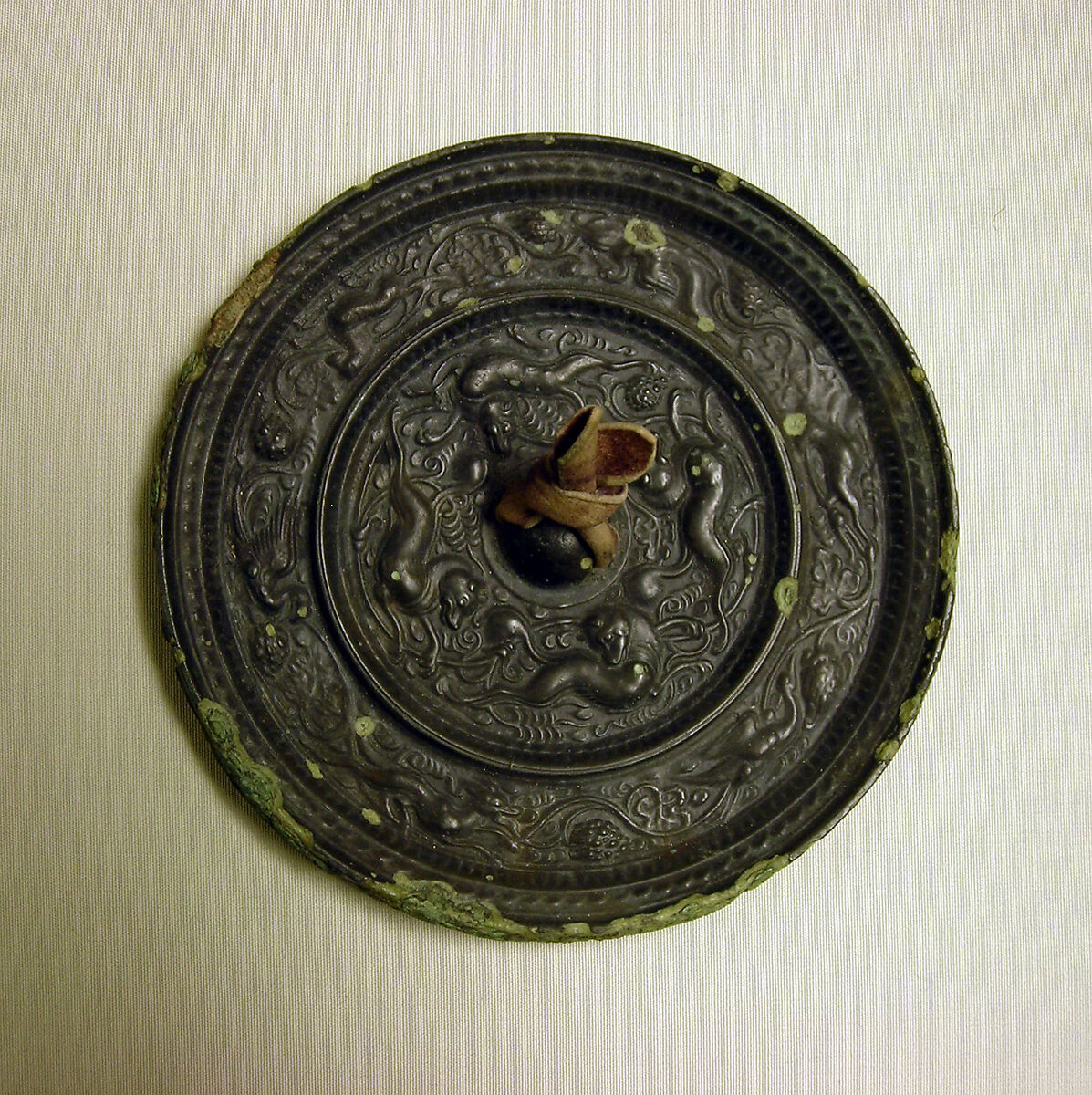 Mirror with fantastic animals, Bronze, China 