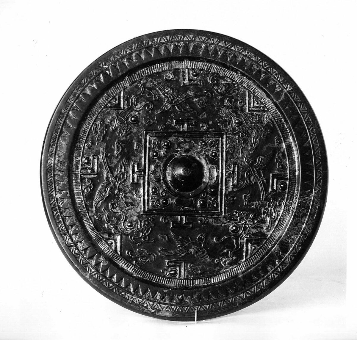 Mirror with board game design and mythical creatures, Bronze with black patina, China