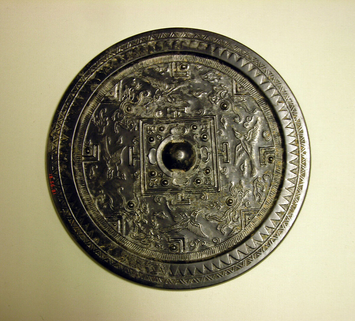 Mirror with board game design and mythical creatures, Bronze with black patina, China 