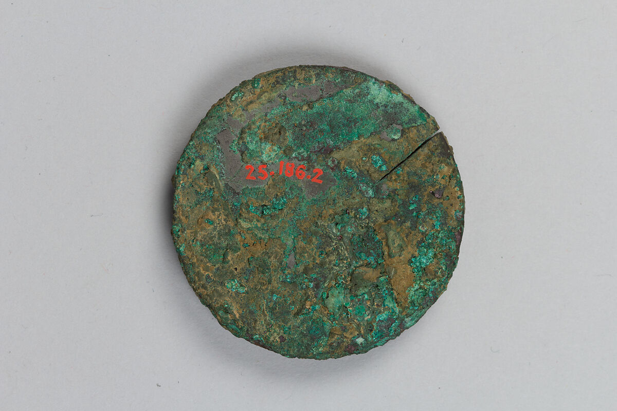 Mirror with birds and lions amid flowers, Bronze with repoussé silver back, China