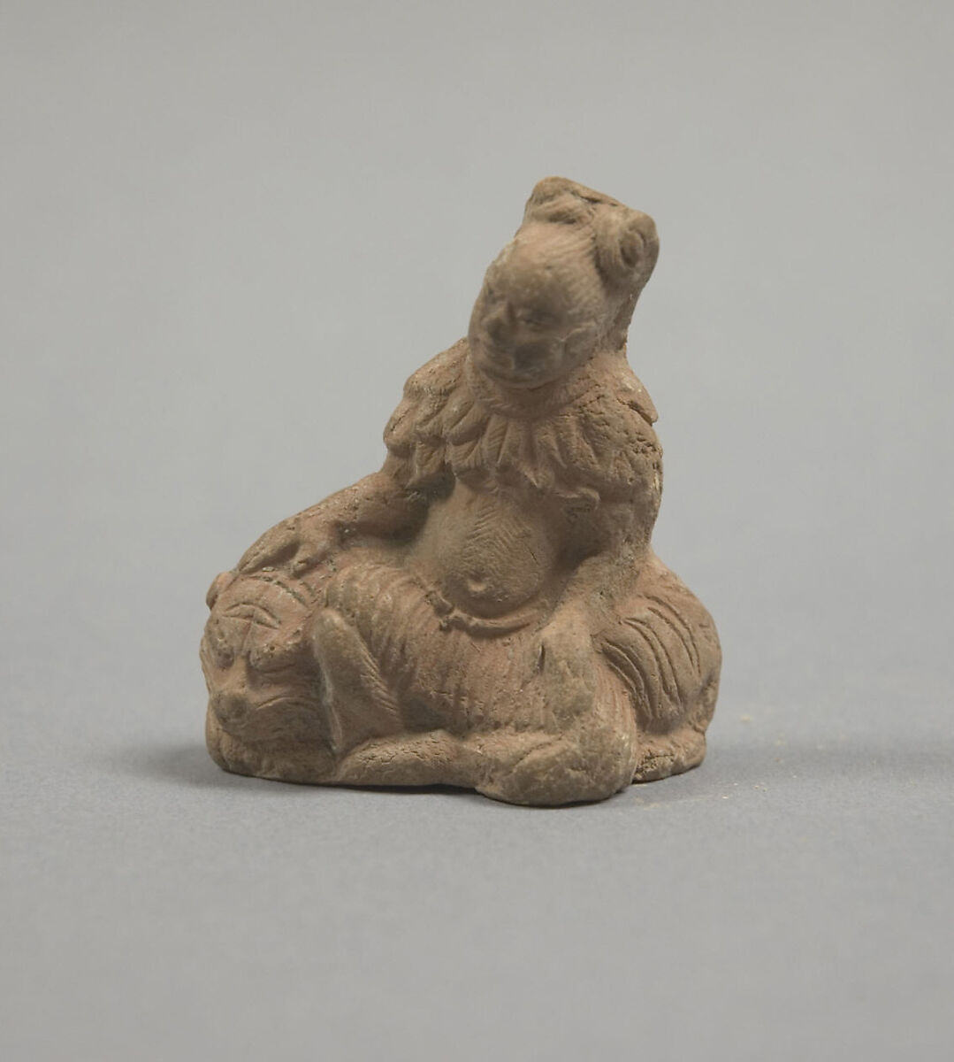 Figure of Luohan and Tiger, Unglazed pottery, China 