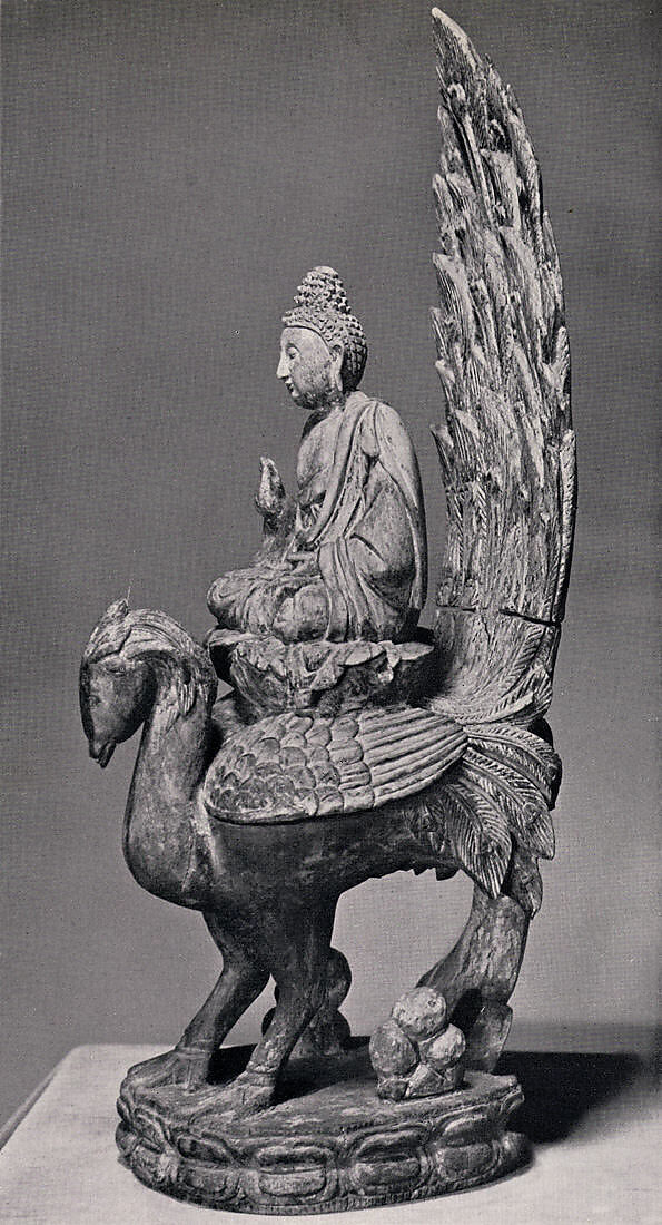 Buddha, possibly Amitabha, on a peacock, Linden wood with traces of pigment, China