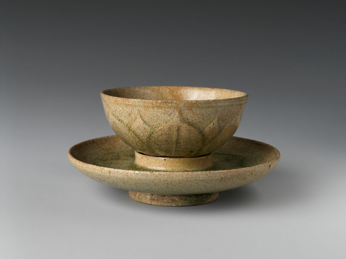 Tea bowl and saucer with lotus decoration, Stoneware with carved decoration under celadon glaze, China 