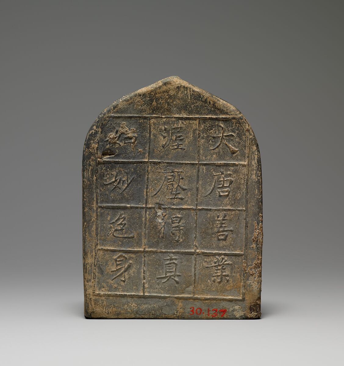 Plaque with Buddhist Triad, Earthenware with traces of pigment and gilding, China