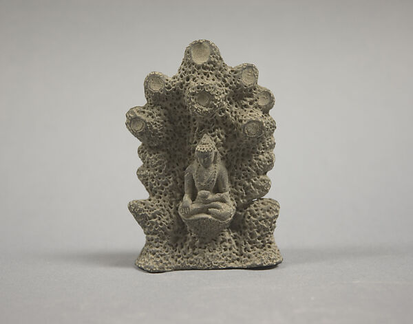 Figure Seated in Grotto., Clay, China 