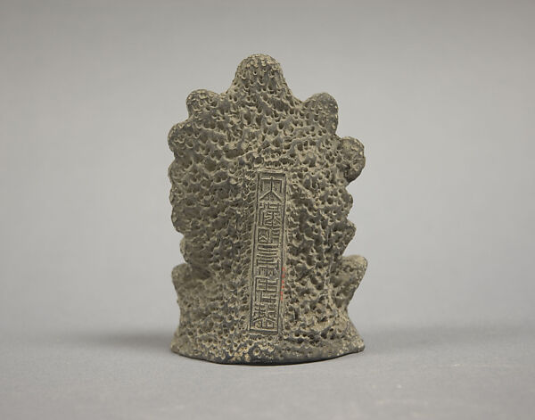 Figure Seated in Grotto., Clay, China