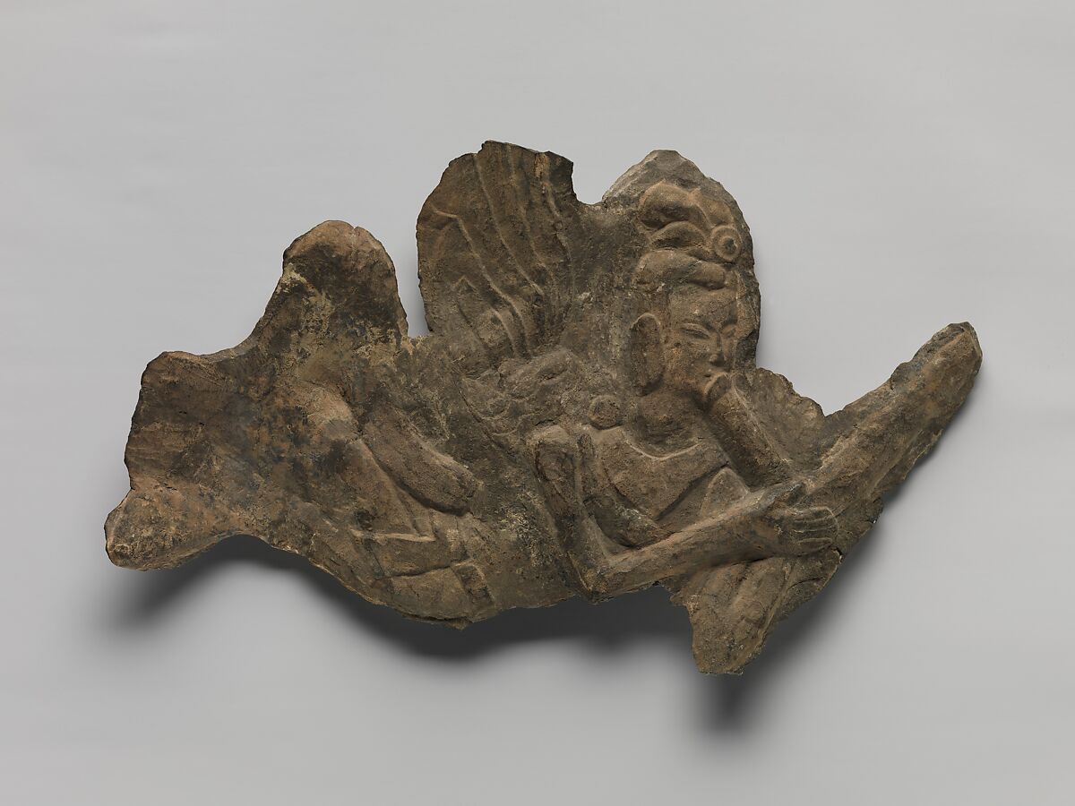 Flying celestial (apsara) fragment, Limestone, China 