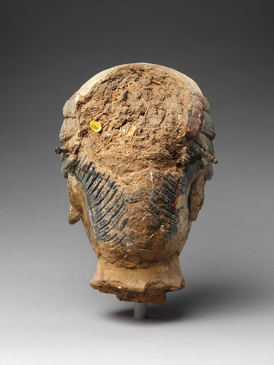Head of attendant, Unfired clay with traces of pigment and gilding, China