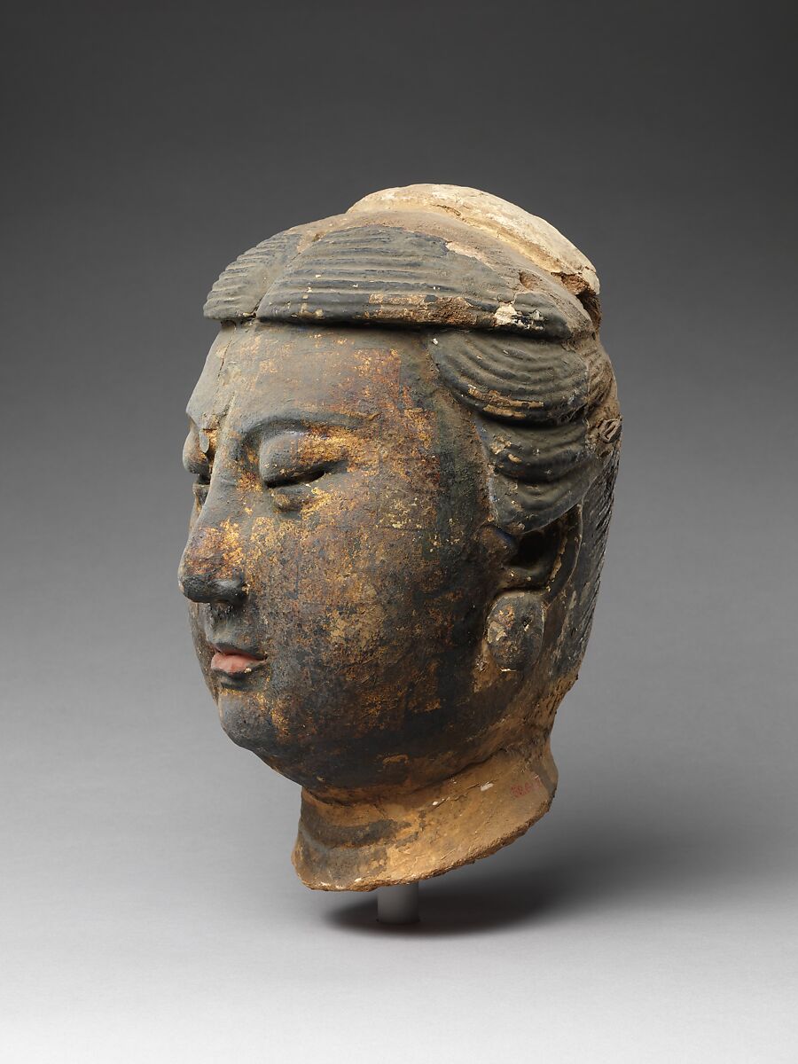Head of attendant, Unfired clay with traces of pigment and gilding, China