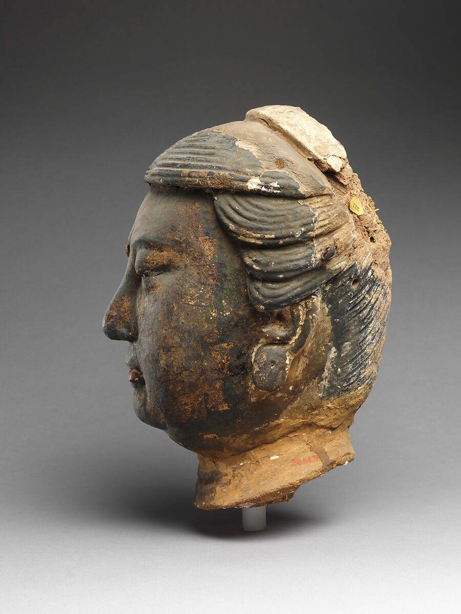 Head of attendant, Unfired clay with traces of pigment and gilding, China