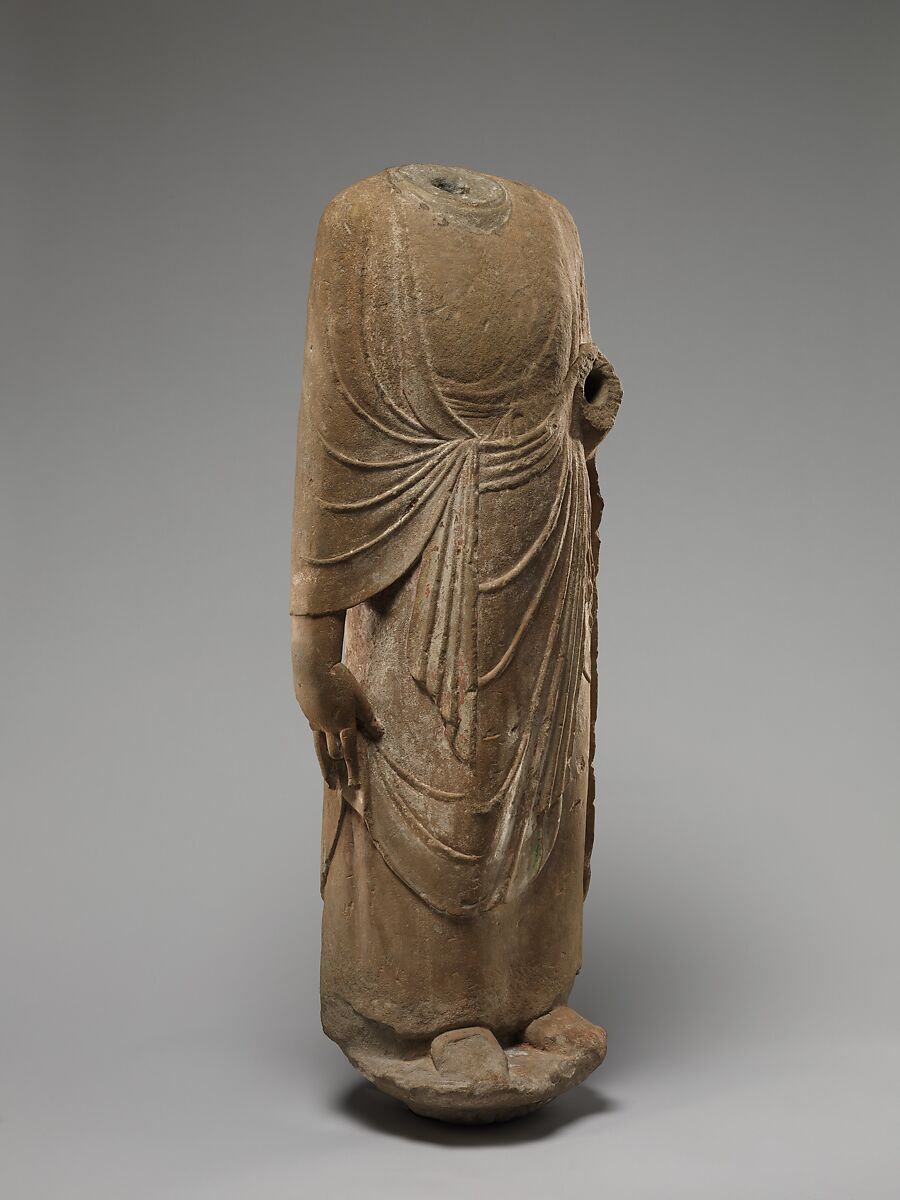 Buddhist attendant (possibly Kasyapa), Sandstone with traces of pigment, China
