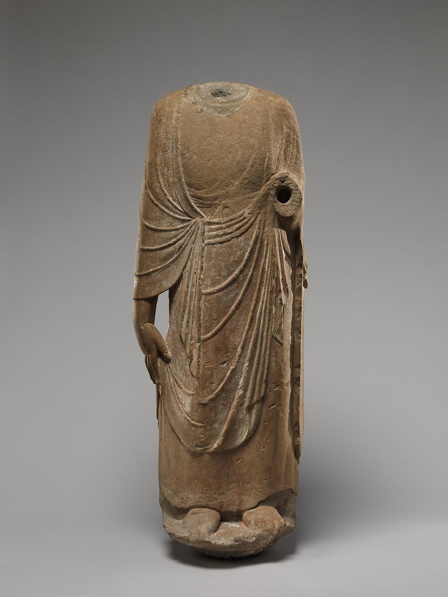 Buddhist attendant (possibly Kasyapa), Sandstone with traces of pigment, China 