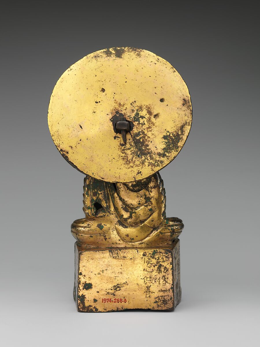 Seated Buddha, probably Shakyamuni (Shijiamouni), Gilt bronze; piece-mold cast, China