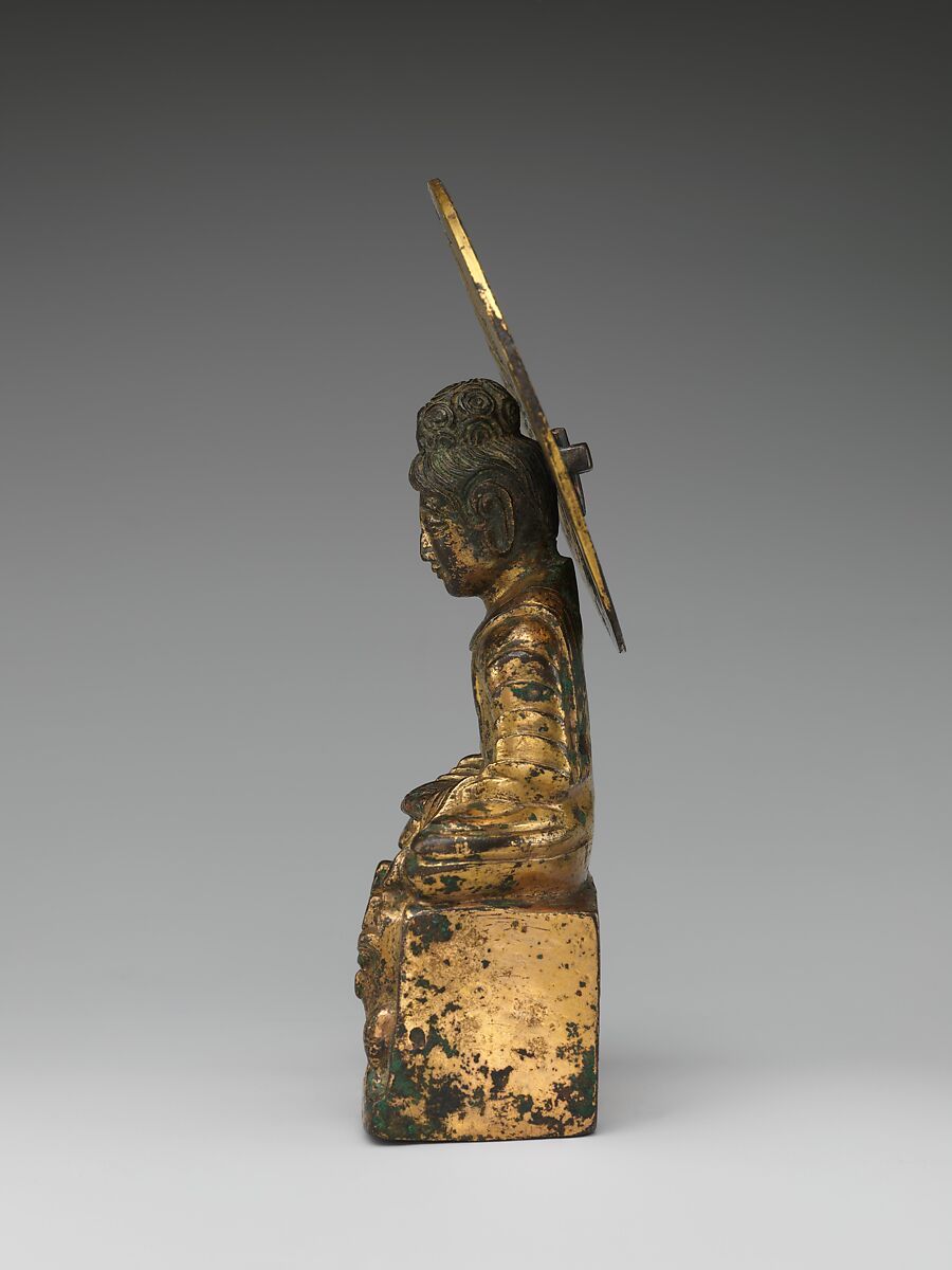 Seated Buddha, probably Shakyamuni (Shijiamouni), Gilt bronze; piece-mold cast, China