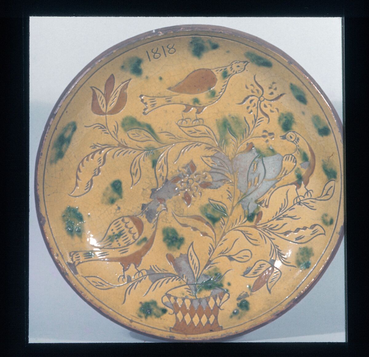 Plate, Attributed to Henry Troxel (active 1799–1829), Earthenware; Redware with sgraffito decoration, American