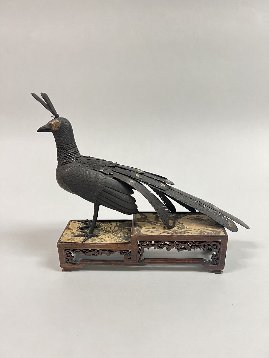 Figure of a Peacock, Bronze, gold or brass inlay, teakwood stand, Japan