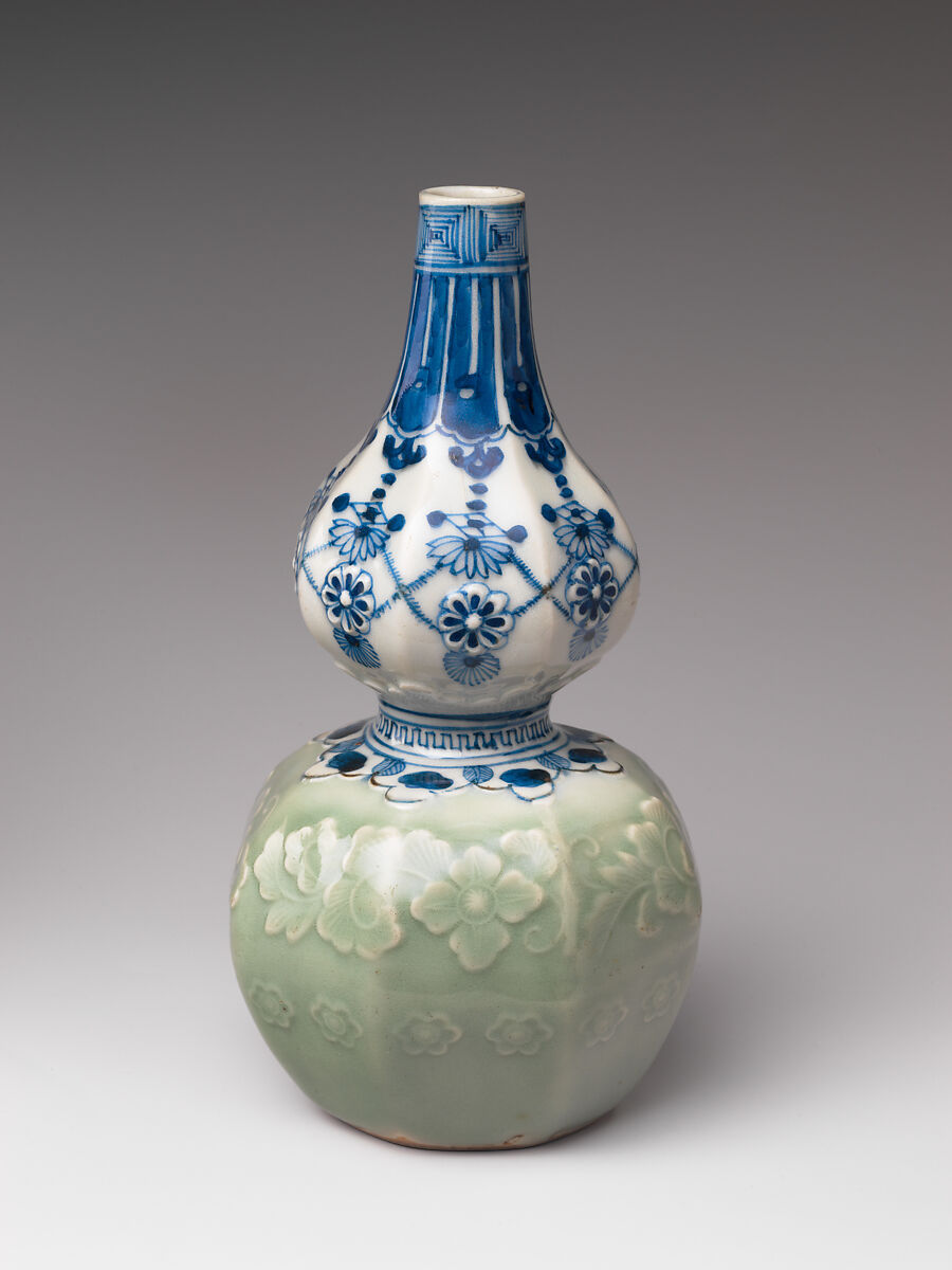 Gourd-Shaped Sake Bottle (Tokkuri) with Carved Floral Design and Jewel, Porcelain with celadon glaze and cobalt blue under transparent glaze (Hizen ware, Arita type), Japan