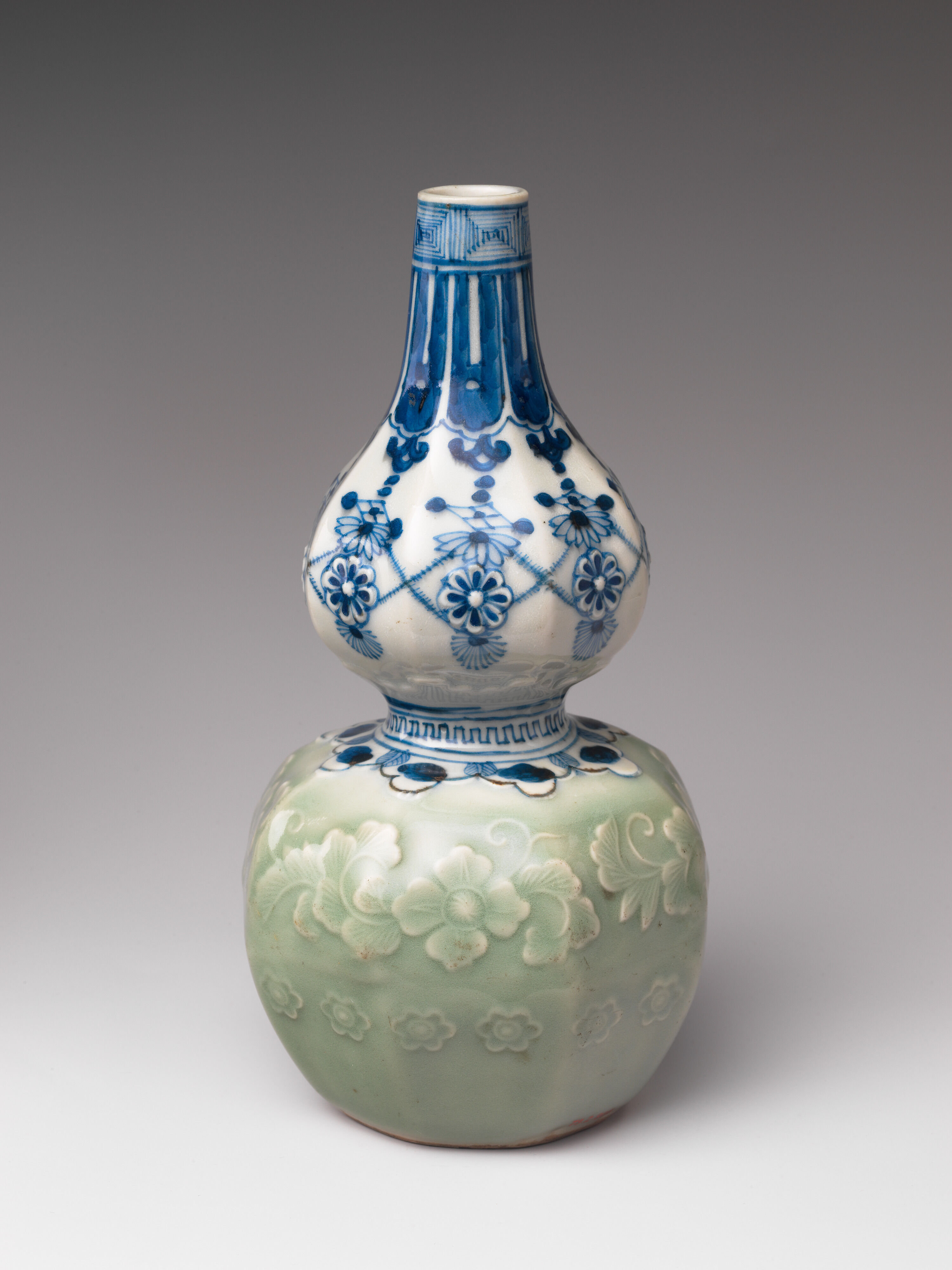 Gourd-Shaped Sake Bottle (Tokkuri) with Carved Floral Design and
