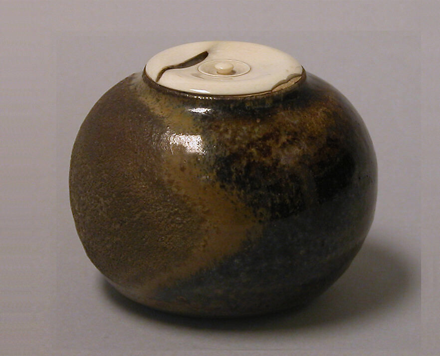 Tea Caddy, Clay covered with a glaze burnt away on one side (Seto ware), Japan