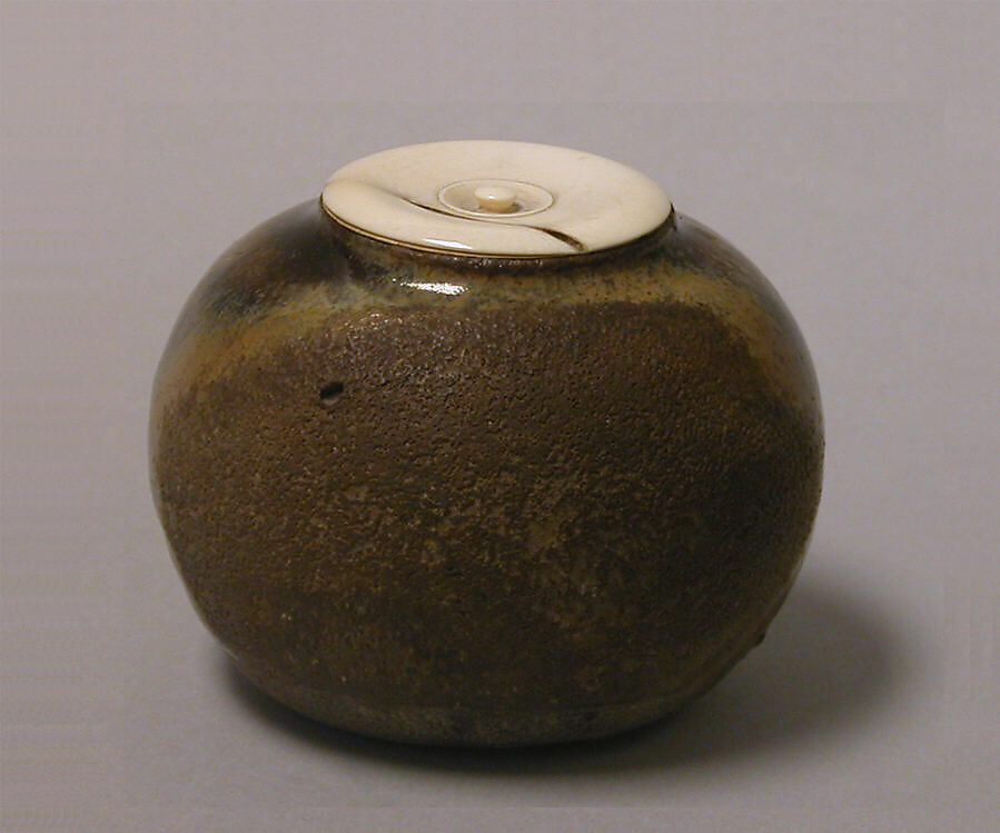 Tea Caddy, Clay covered with a glaze burnt away on one side (Seto ware), Japan