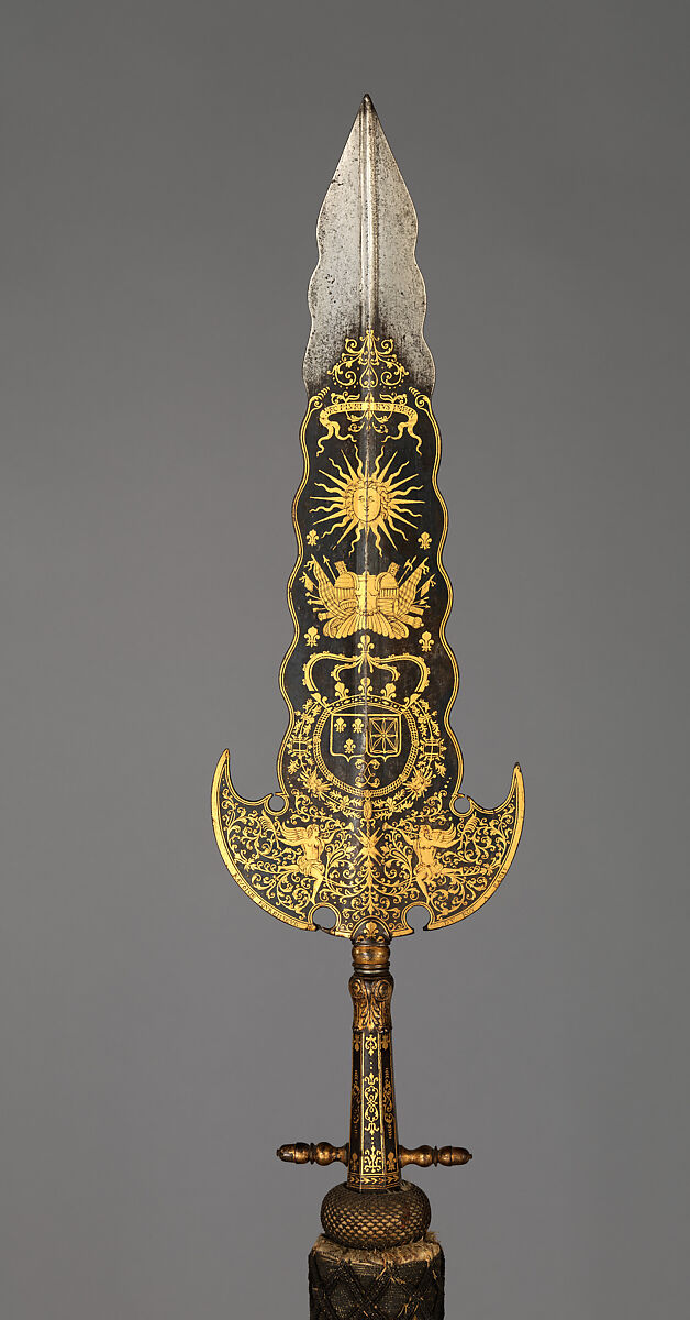 Three Partisans Carried by the Bodyguard of Louis XIV (1638–1715, reigned from 1643), 14.25.454 designed by Jean Berain (French, Saint-Mihiel 1640–1711 Paris), Steel, gold, wood, textile, brass, French, Paris