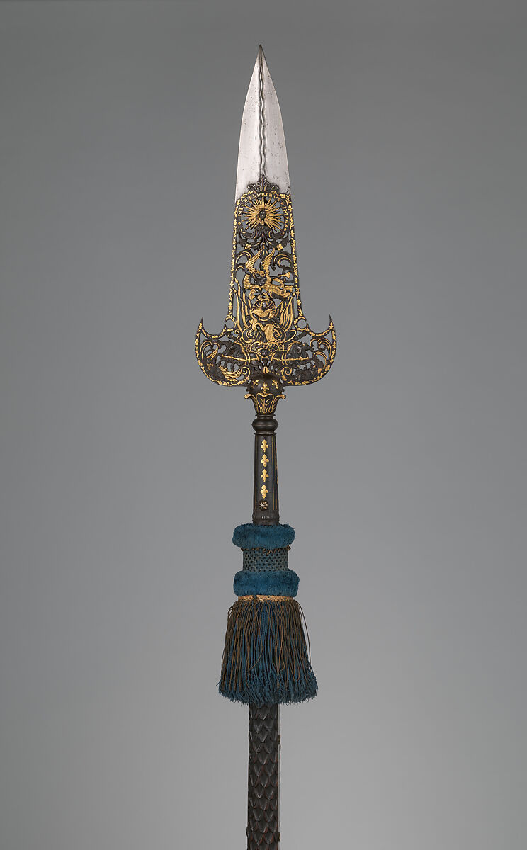 Three Partisans Carried by the Bodyguard of Louis XIV (1638–1715, reigned from 1643), 14.25.454 designed by Jean Berain (French, Saint-Mihiel 1640–1711 Paris), Steel, gold, wood, textile, brass, French, Paris
